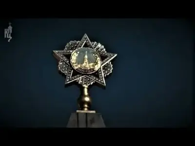 Patriarch Kirill offering the Holy Cross at a monument glorifying the Red Antichrist