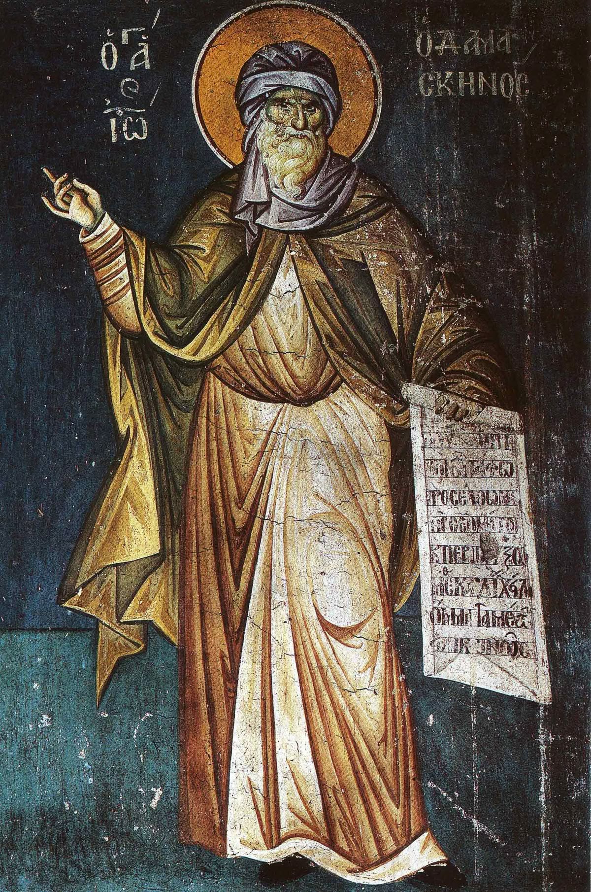 Athonite fresco of St. John of Damascus holding an open scroll with Greek text, wearing monastic robes