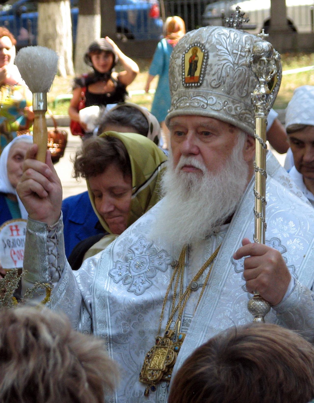 Filaret Denysenko outside the Volodymyrska church in Kyiv, Ukraine, in 2008, wearing white episcopal vestments and holding a staff