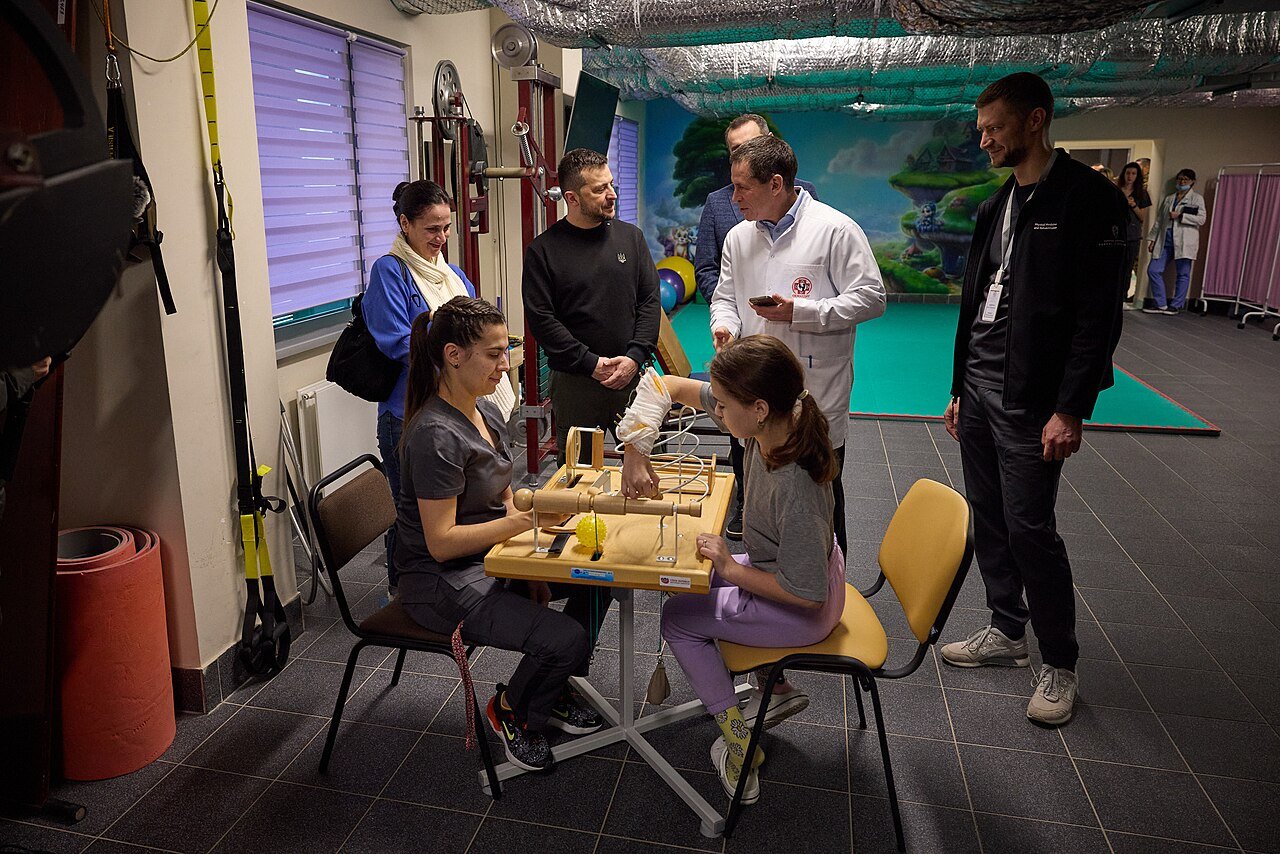 Aftermath at Okhmatdyt, rescue workers and families outside the damaged hospital