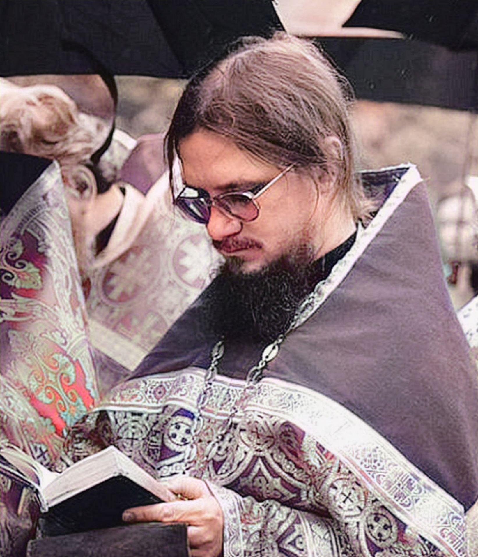 Hieromartyr Daniel Sysoev (reading during service)