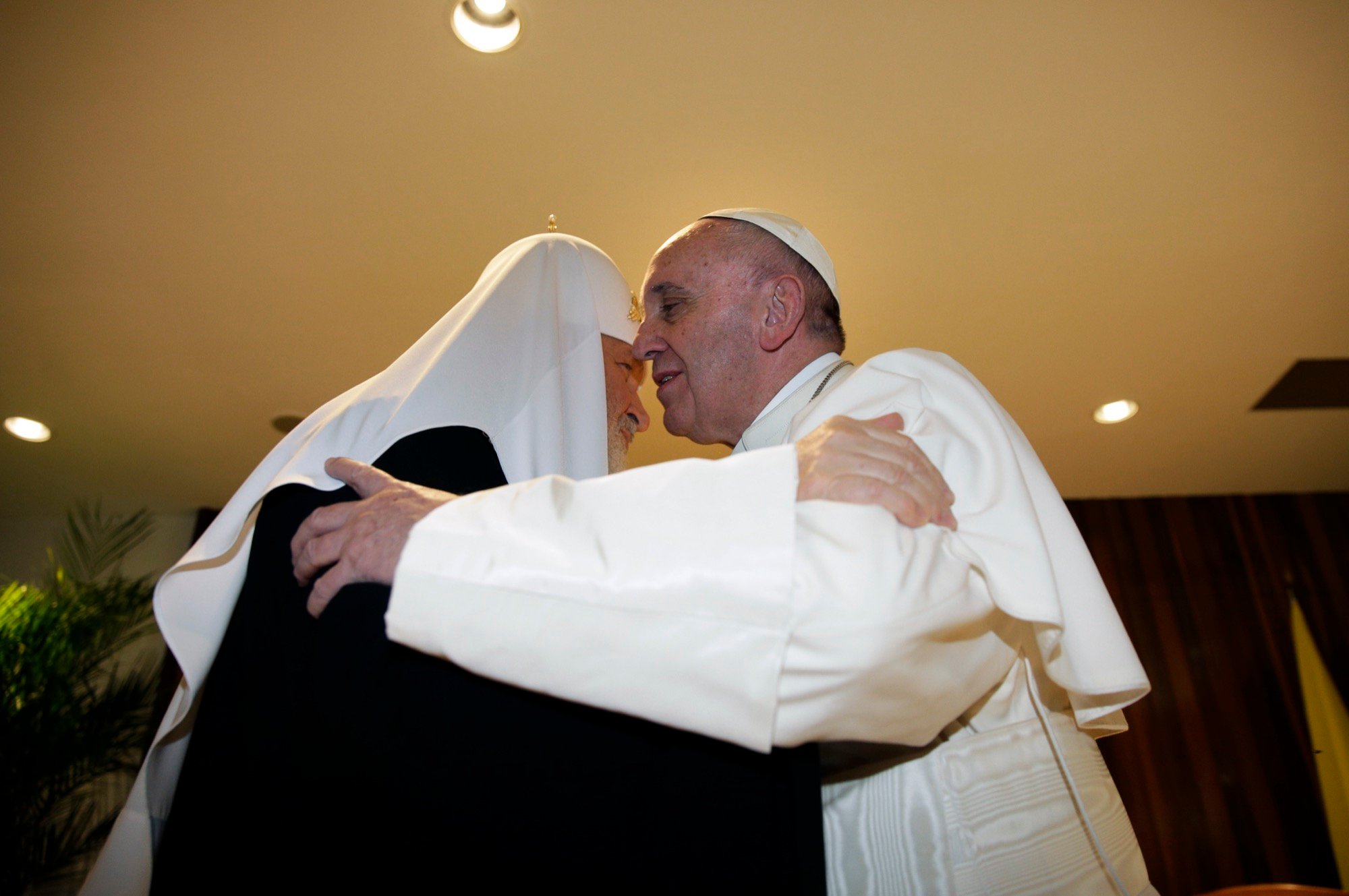 Patriarch Kirill and Pope Francis embrace at the José Martí airport in Havana, Cuba, February 12, 2016, exchanging the Kiss of Peace at their first-ever meeting