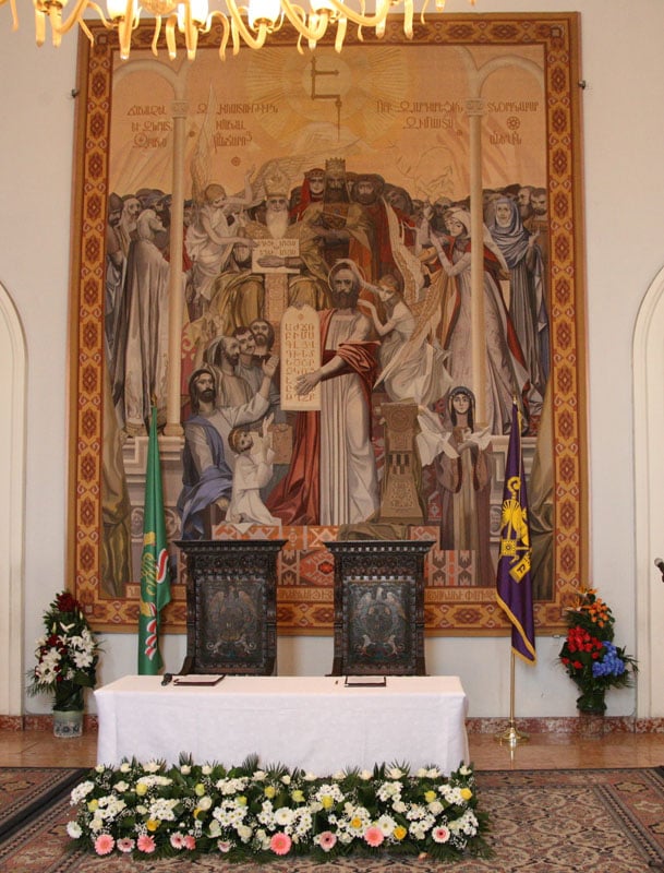 Interior of the Mother See of Holy Etchmiadzin in Armenia showing two thrones before an Armenian fresco mural, set for the 2010 meeting between Patriarch Kirill and Catholicos Karekin II