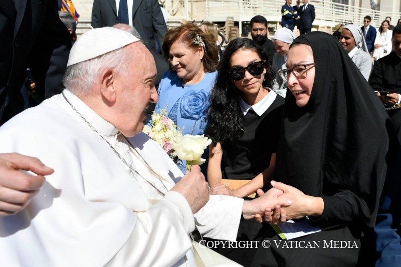 Dr. Vassa Larin in Orthodox monastic habit meeting Pope Francis at a papal audience in 2023